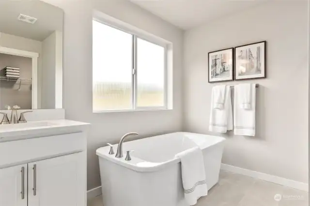 *Optional soaking tub* Pictures of same floorplan at different site. Specs/finishes differ.