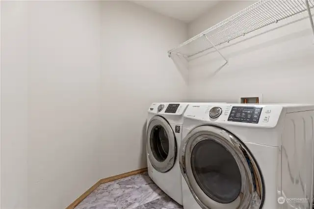 Full Size Washer and Dryer and spacious laundry room