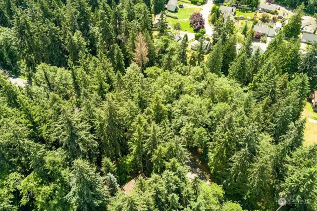 Aerial View of enclosure. Lot includes community water access and beach amenities.