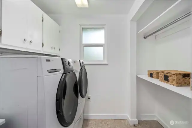 Utility room with sink and closet