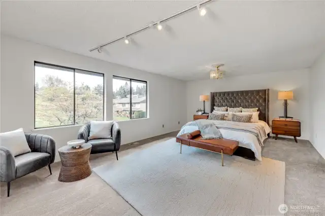 Virtual Staging - This shows off the ample space of this bedroom, not to mention the lovely windows looking out over the rolling emerald fairways