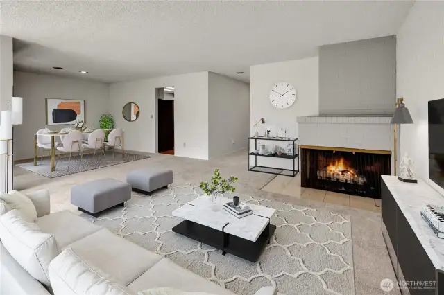 Virtually Staged - you entry from the front entry into the open concept main living area just left of the fireplace