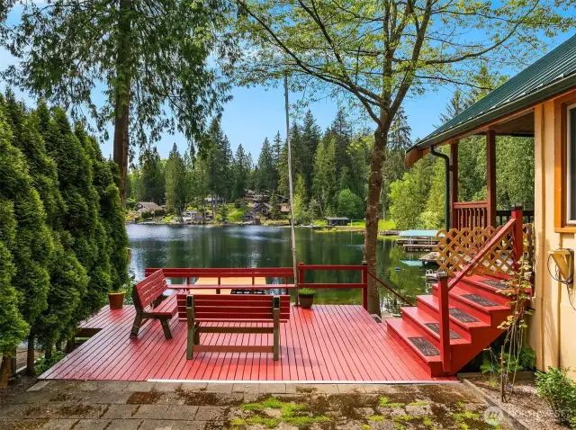 Side deck granting lake views and access to lower and upper levels.