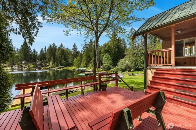 Side deck with easy access to lower yard area as well as upper covered deck.