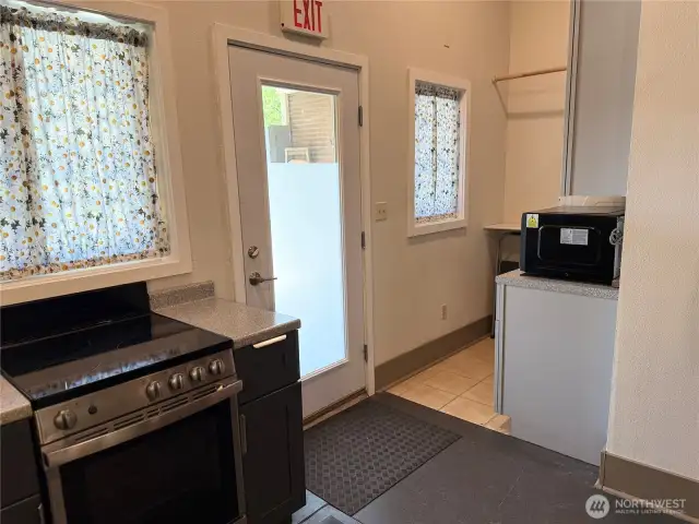 back door leads to covered parking/pati