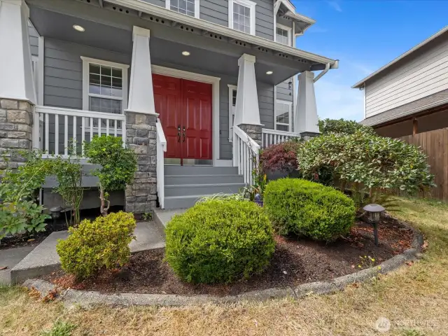A charming front porch sets the tone, creating a warm and welcoming entryway.