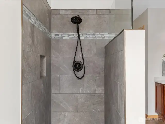 Gorgeous brand new tilework in the shower.