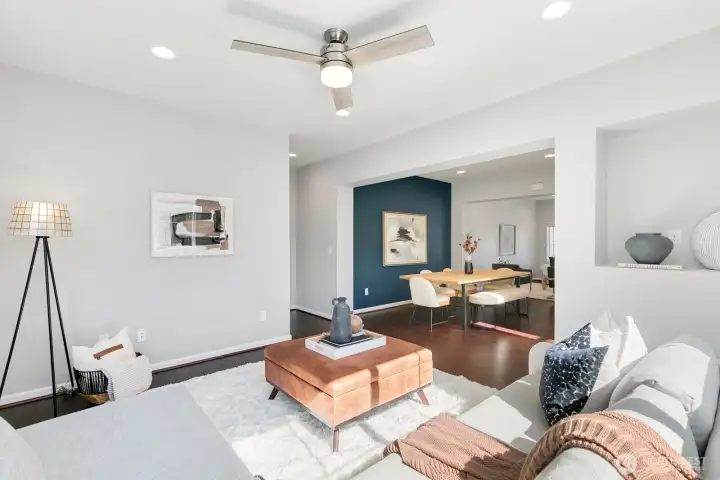 Formal living space sits away from kitchen for a quieter retreat.