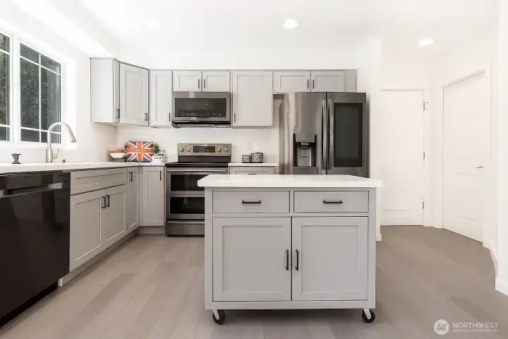 Remodeled kitchen with a virtual staged mobile island