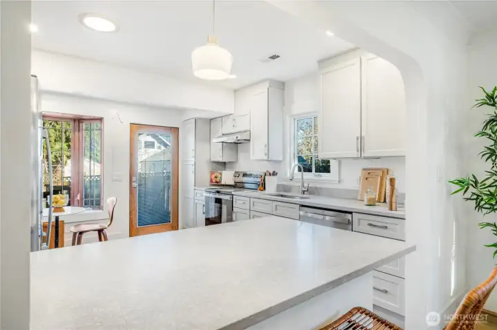 New Quartz counters and back splash, stainless steel appliance package, new cabinetry, lighting and Oak flooring.
