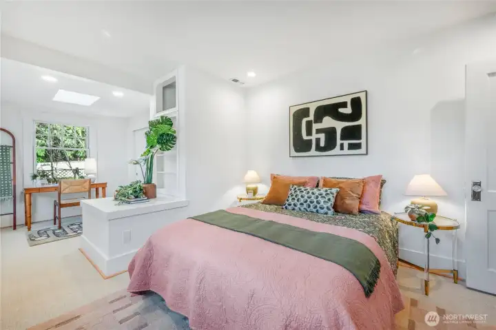 Second large, main level bedroom. New wool carpeting, trim, recessed lighting, paint and hardware.