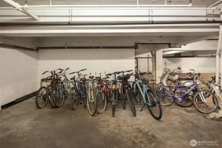Community bike storage located in garage.