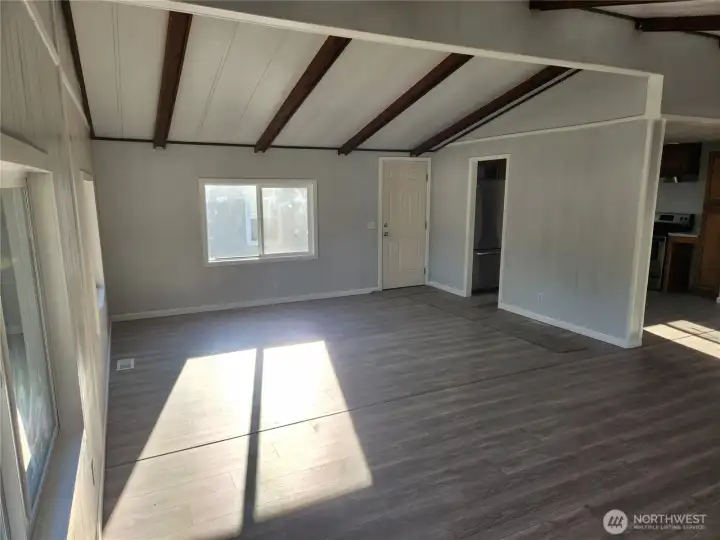 Large Living Room looking towards Kitchen and Front Door