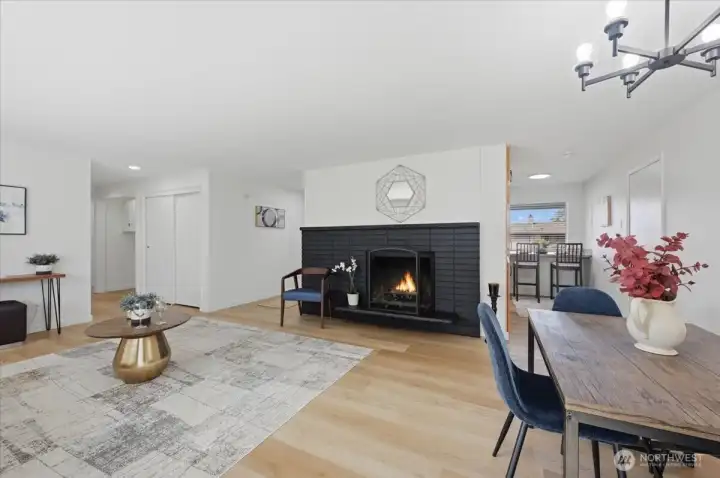 Living room with new luxury vinyl plank flooring throughout. New interior paint throughout.