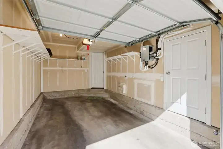 High ceiling garage with storage