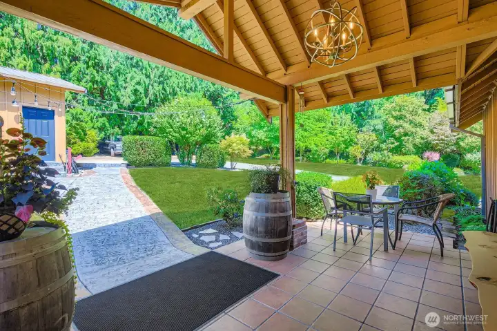 Covered patio entry with lovely garden outlook. Covered patio entry with lovely garden outlook.