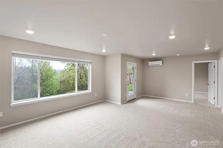 Lower level living/rec room empty.