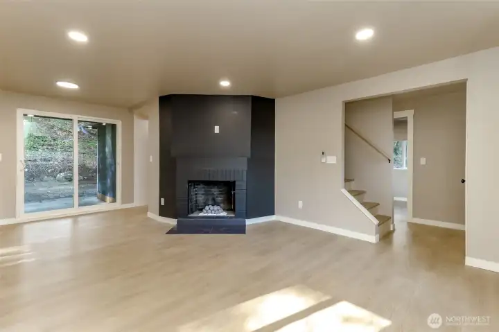 Living room with beautiful statement piece wood fireplace