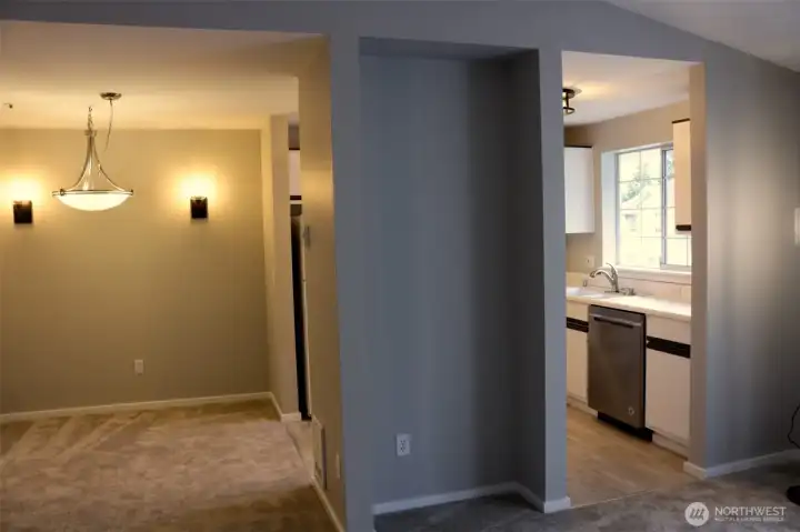 dining room, living room niche, kitchen, looking from back wall of living room