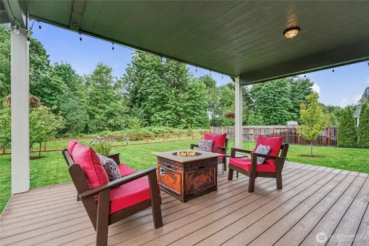 Wait until you see this backyard! Fully fenced with nature lands behind, HUGE covered trex-like deck, you will love the size and privacy of this yard.