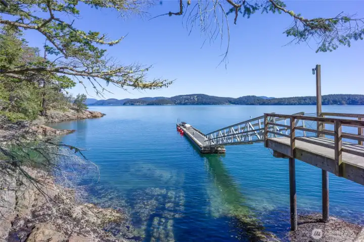 Shared, well built dock with water and power.