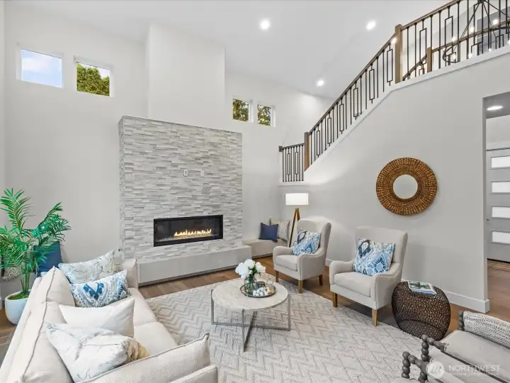 Two story ceiling in the great room with gas fireplace.
