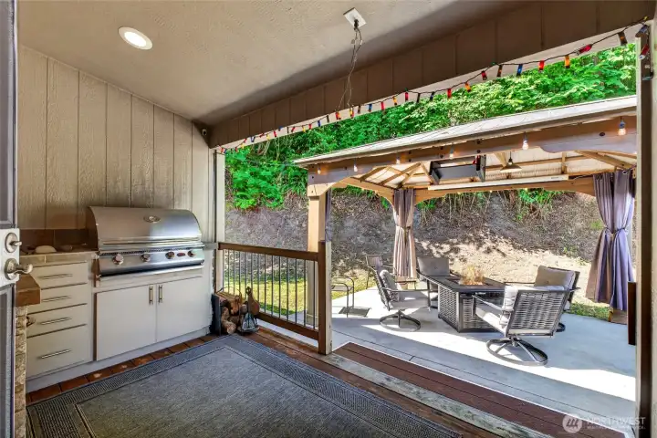 Outside, covered, protected kitchen Outside, covered, protected kitchen