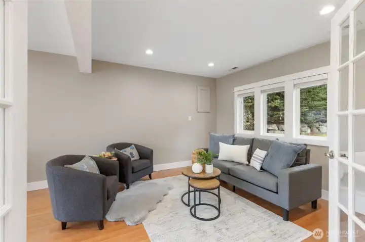 Sitting, dining, relaxing room to french doors to the back. Sitting, dining, relaxing room to french doors to the back.