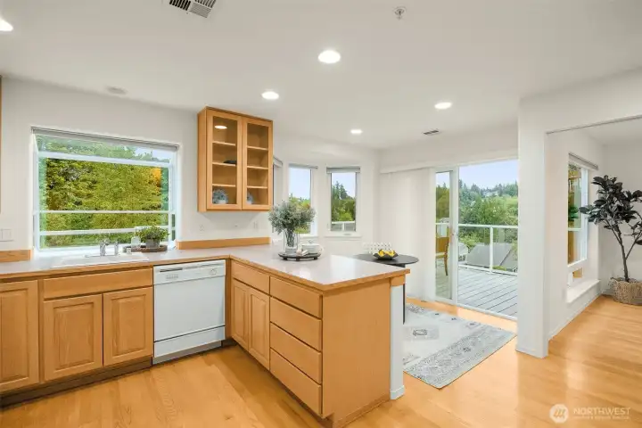 Large kitchen adjacent to the dining room; just a few steps from the deck Large kitchen adjacent to the dining room; just a few steps from the deck