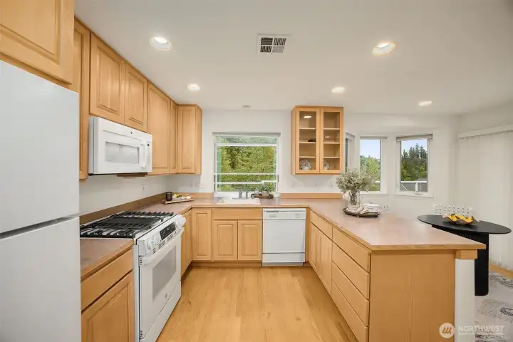 New stove and double ovens in this large open kitchen New stove and double ovens in this large open kitchen