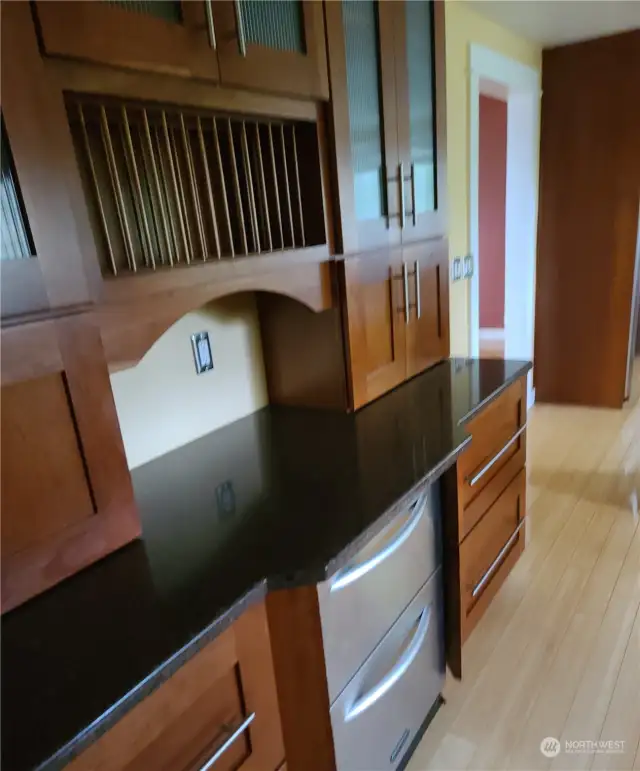 Storage in kitchen area with built in freezer.