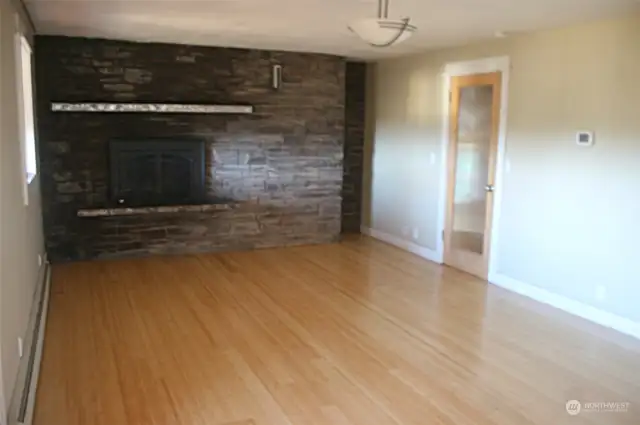 Primary bedroom with fireplace.