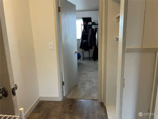 Hallway towards primary bedroom