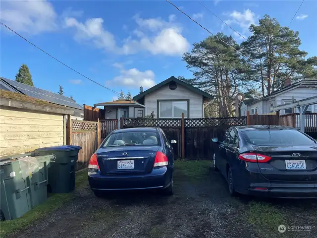 Parking for two vehicles off the alley