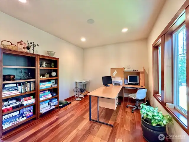 The main floor has a large office/flex space with its own separate entry.