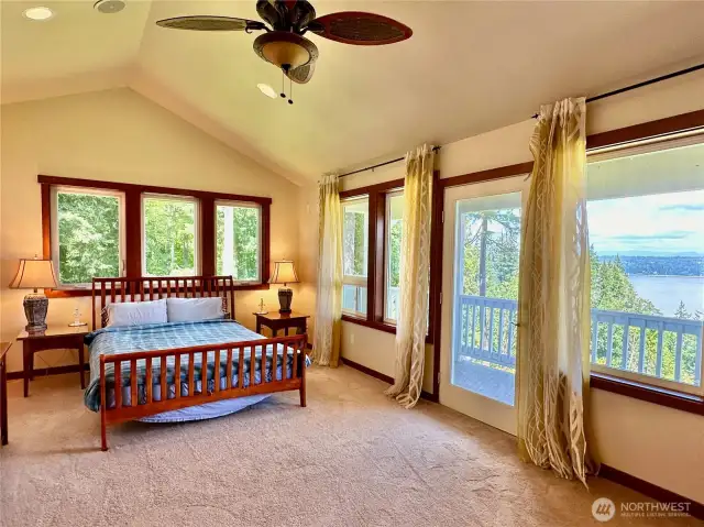 The upper primary bedroom has a deck, large walk-in closet, fireplace & full ensuite with jetted tub.