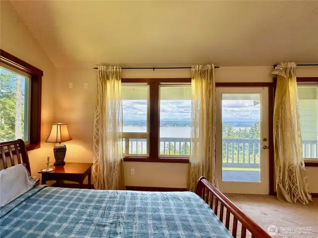 The upper primary bedroom has a deck, large walk-in closet, fireplace & full ensuite with jetted tub.
