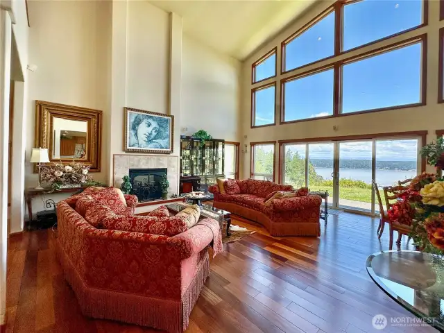 Open Great Room with vaulted ceilings and floor-to-ceiling windows let in the light and views.