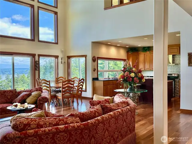 Open Great Room with vaulted ceilings and floor-to-ceiling windows let in the light and views.