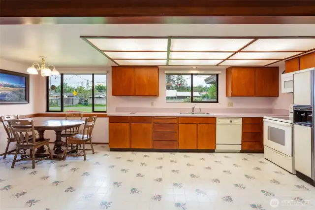 This kitchen is so big.  There is a pantry to the left of picture, and corner nook with storage area