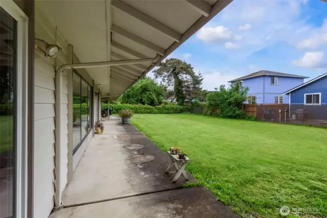 Covered patio and backyard