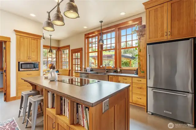 Expansive kitchen featuring abundant workspace and impeccable custom cabinetry craftsmanship.