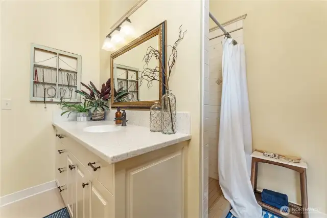 Primary bathroom shower area.