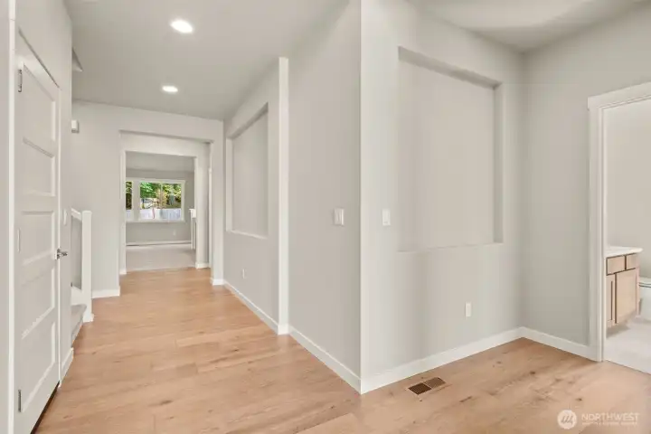 Extensive hardwood floors throughout entry, kitchen and dining room.