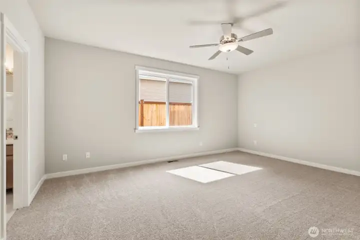 French doors open up to primary bedroom on main level.