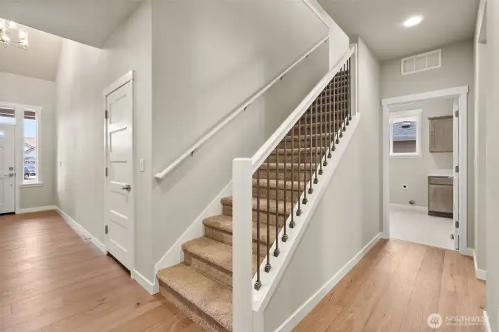 High end finishes like wood and metal railing on stairway
