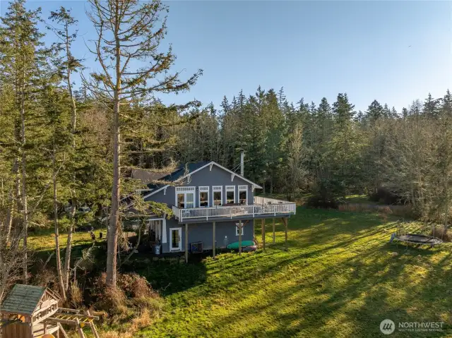 A winding drive through mature woods gives way to open pasture. Here you will find an ADU and all the infrastructure for the main home.