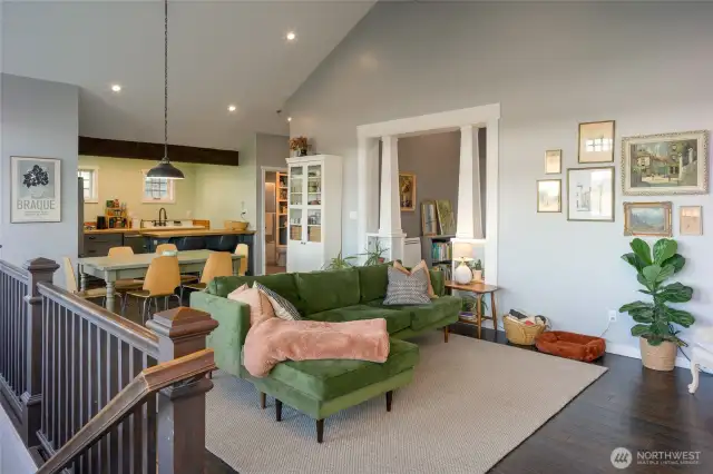 Open living/dining/kitchen on the upper floor.
