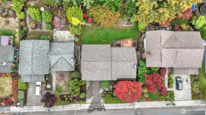 A bird’s-eye view showcasing the home’s private yard and thoughtful outdoor spaces