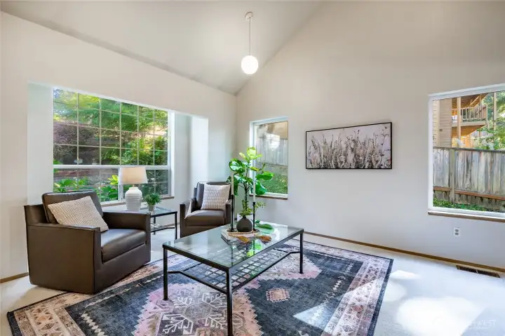 Soaring 2-story ceilings in the Living Room with lots of natural light.